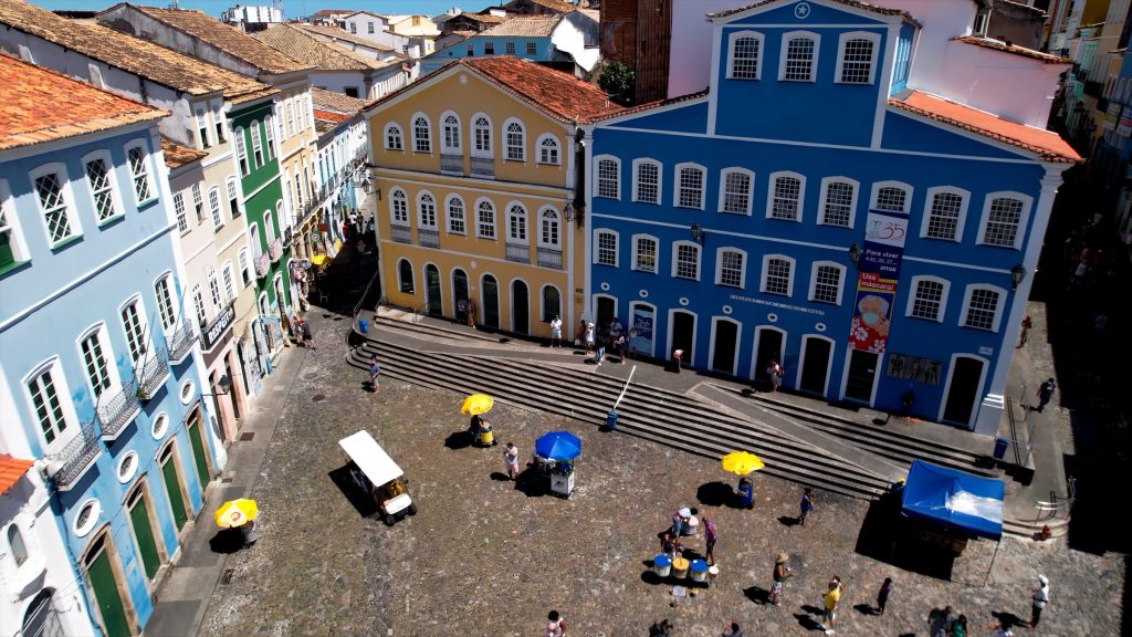 iscover the soulful charm of Pelourinho, Salvador, a UNESCO World Heritage site in northeast Brazil, where vibrant colonial buildings line historic cobblestone streets, alive with culture and tradition.